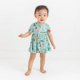 Posh Peanut Short Sleeve Ruffled Bodysuit Dress - Around the World - Let Them Be Little, A Baby & Children's Clothing Boutique